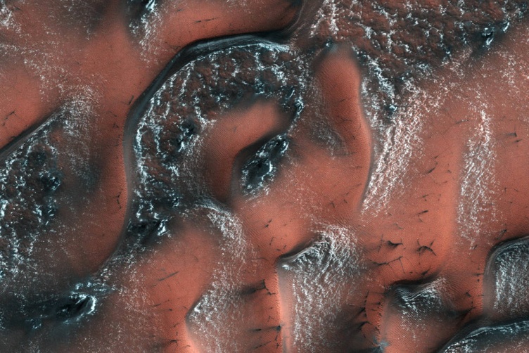 NASA's Mars Reconnaissance Orbiter captured this image of carbon dioxide snow covering dunes on Mars. Credit: NASA/JPL/University of Arizona