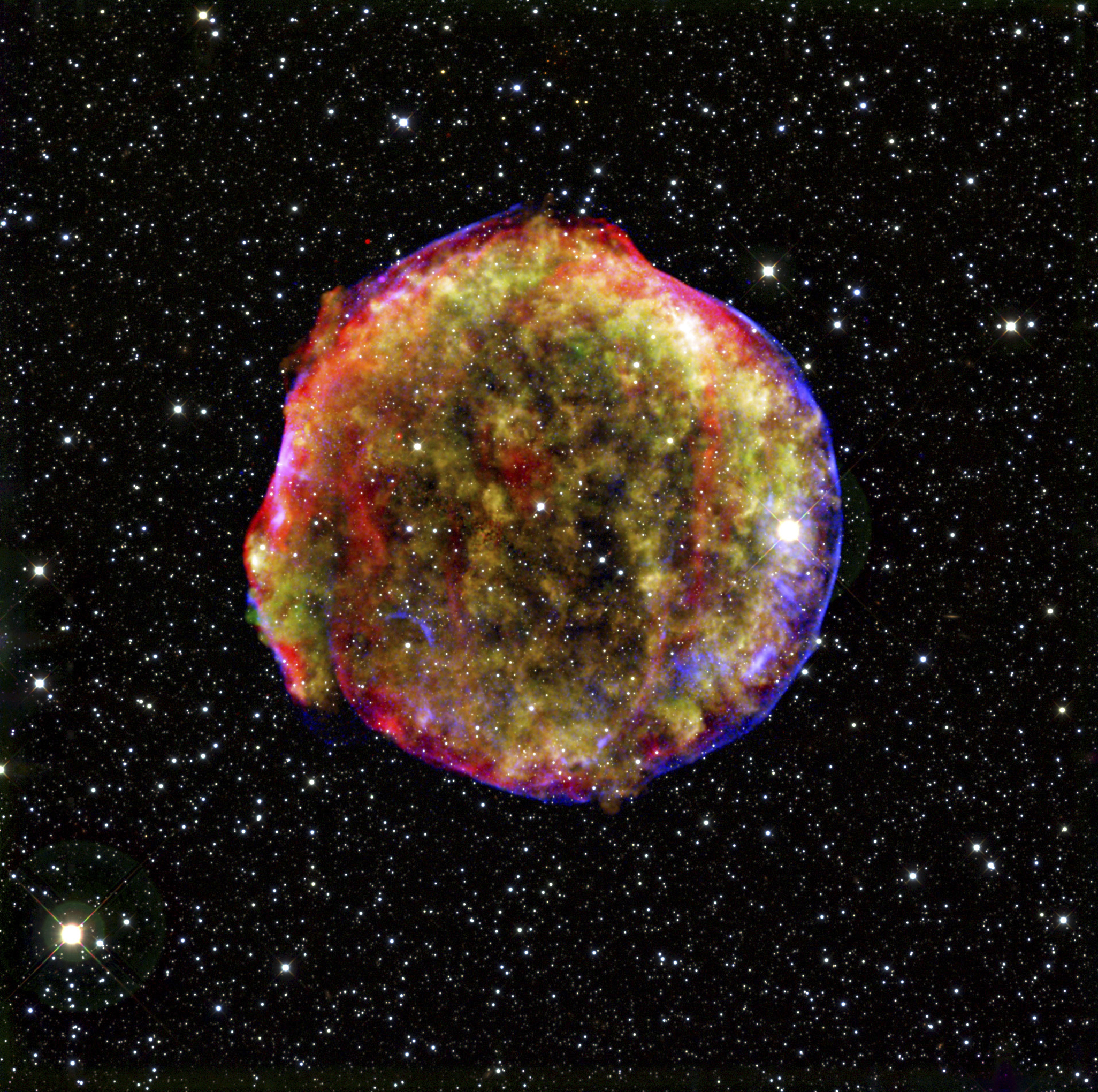 Glowing cloud of gas left from the Tycho supernova of 400 years ago.